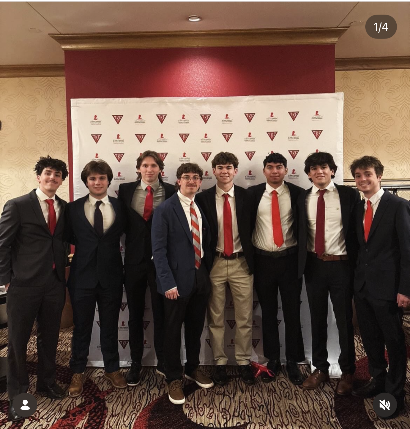 Kappa Nu members in suits at a St. Jude fundraising event